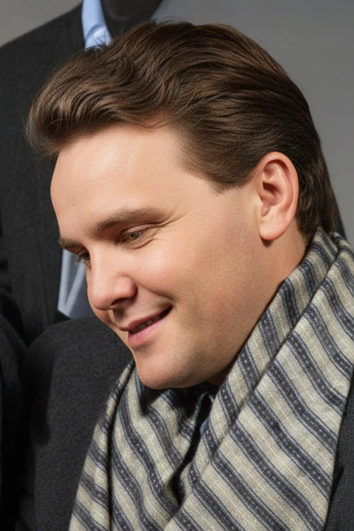 Неjат Окçугил