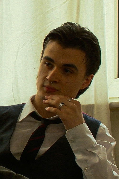 Том Карайел