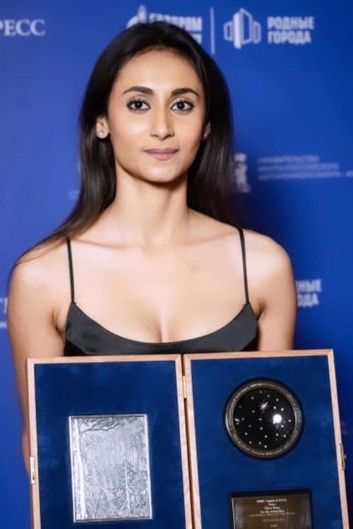 Танайа Кхан Jха