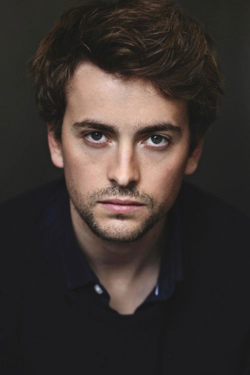 Том Енгланд