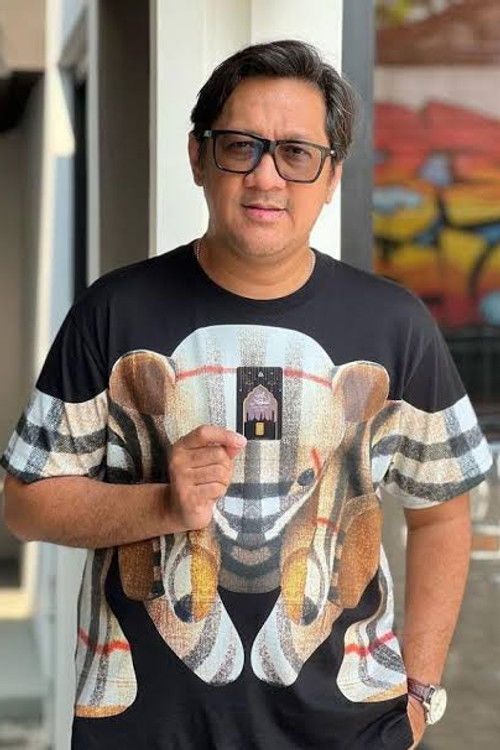 Андре Тауланй