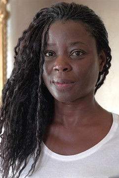 Телла Кпомахоу