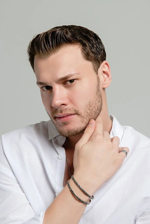 Толга Кандемир