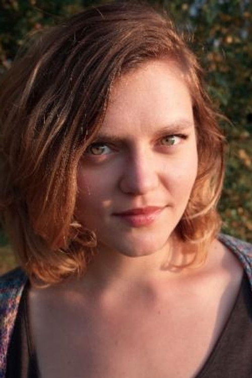 Адéла Комрзý