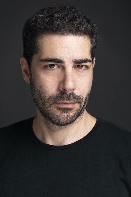 Екрем Йüцелтен