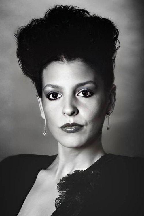 Лиса Саxтон