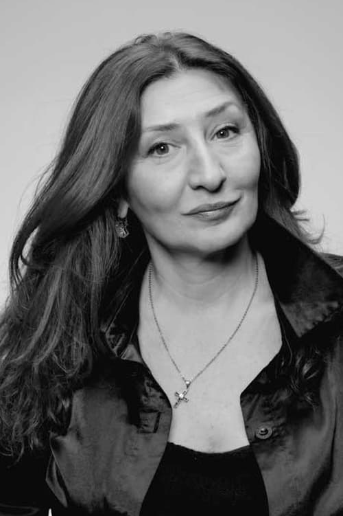 Нино Qомартели