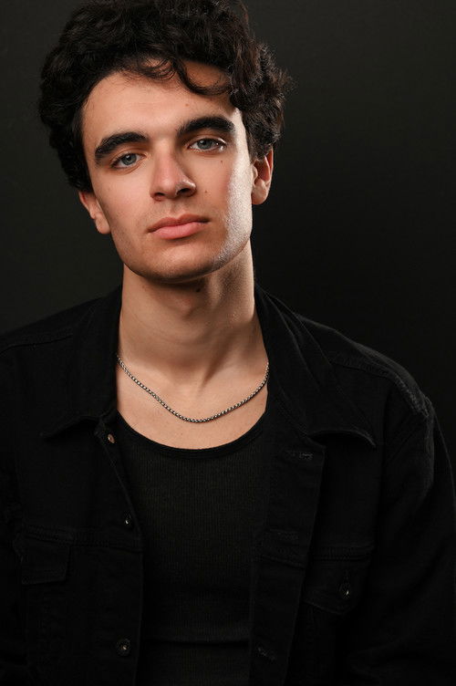 Адам Милхандер