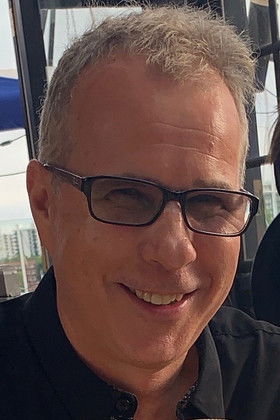 Бретт Доwлер