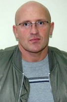 Роберт Комар