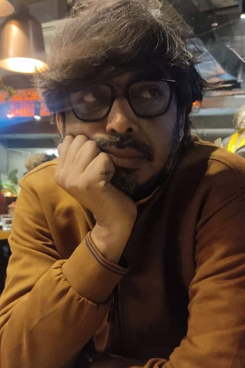 Суман Маитра