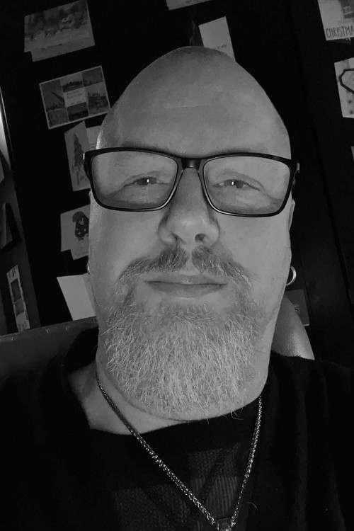 Jохн Е. МцЛенацхан