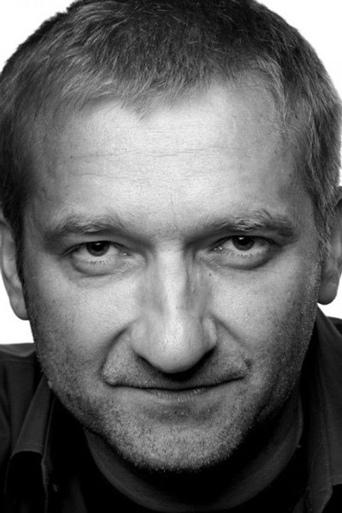 Адам Хутйра