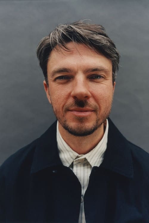 Том Скиннер