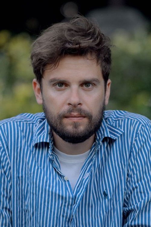 Бенjамин Тхолозан