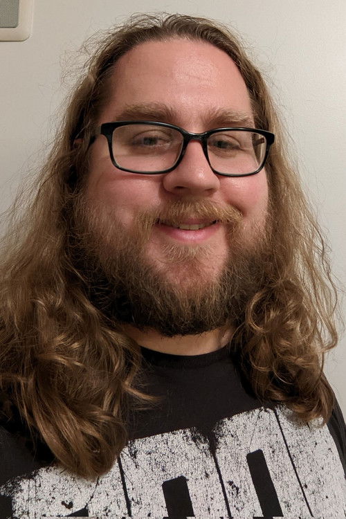 Давид Сзймански