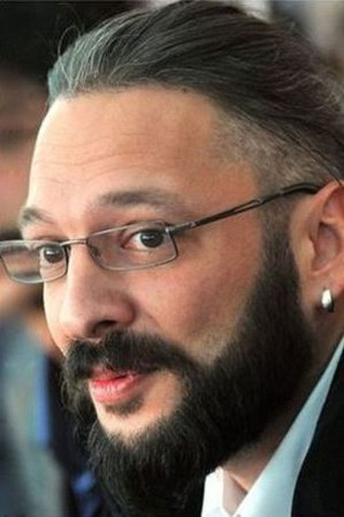 Ерхан Козан