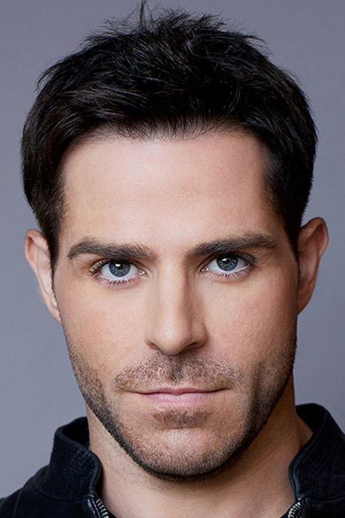 Неил Еллице