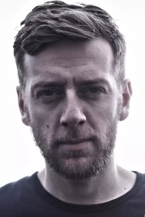 Бриан Хjулманн