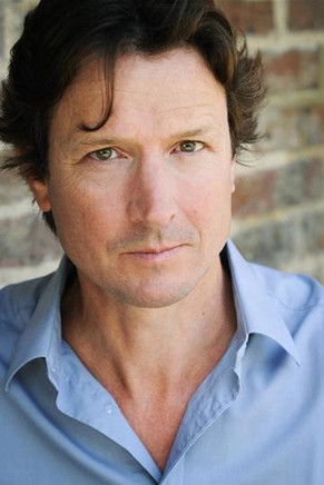 Том Бутцхер