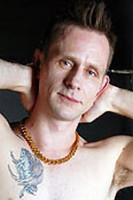 Доминиц Травис