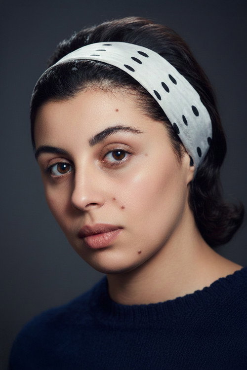 Толга Тиğин