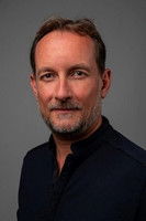 Дамиен Лаqует