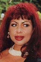 Гина Цоланй