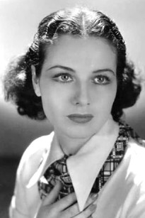  Джун Трэвис