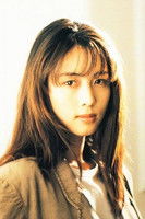 Изуми Сакаи