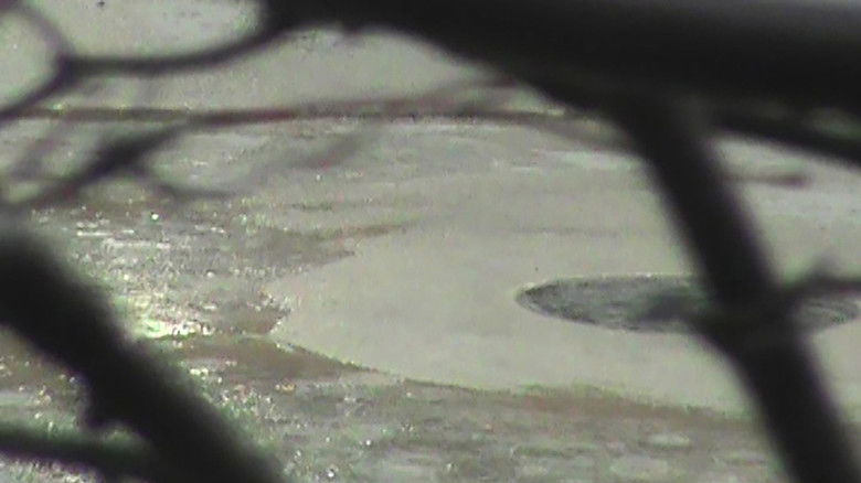 кадр из фильма rainy streets