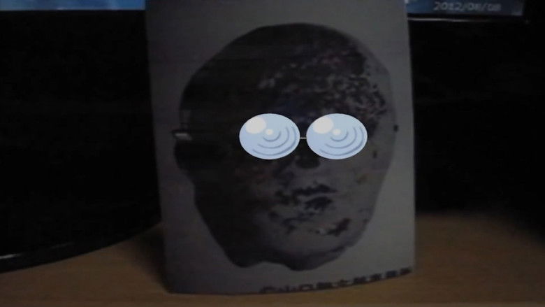 кадр из фильма 呪い面