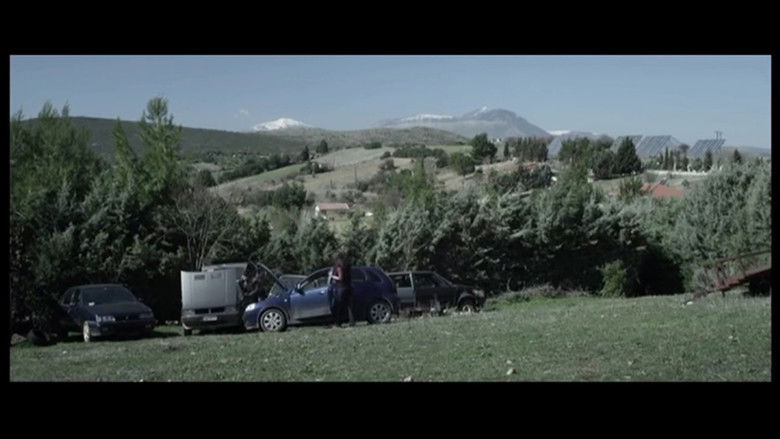 кадр из фильма Να Κάθεσαι Και Να Κοιτάς