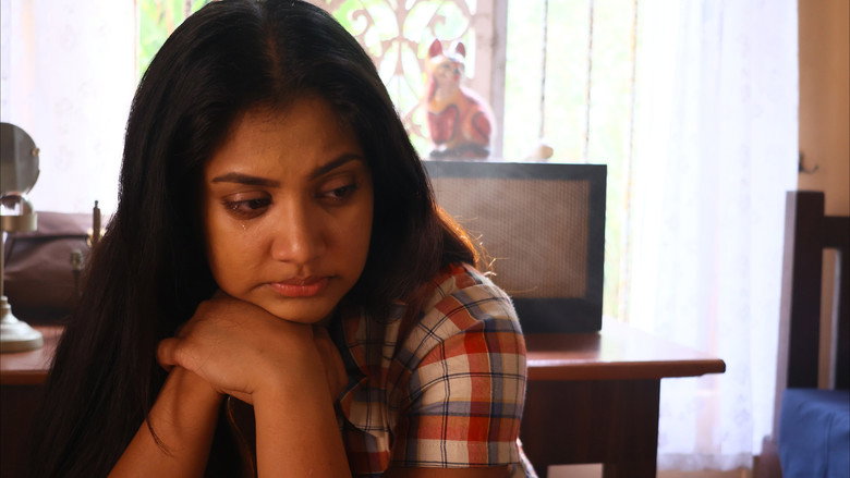 кадр из фильма එදා රෑ