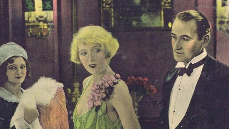 кадр из фильма Silks and Saddles