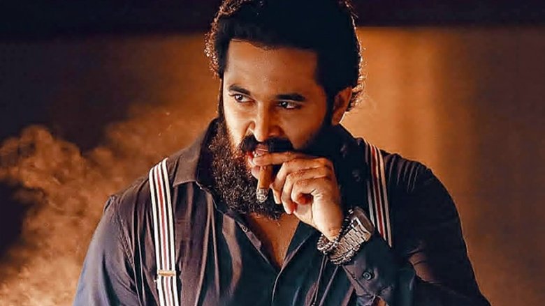 кадр из фильма മിഖായേൽ