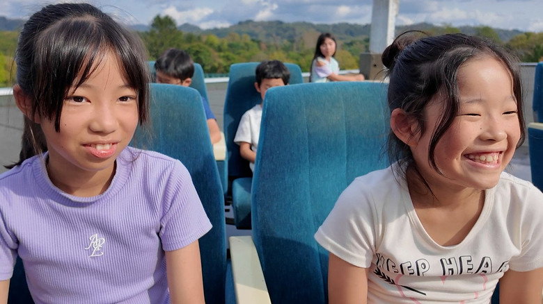 кадр из фильма 屋上映画館の子供たち