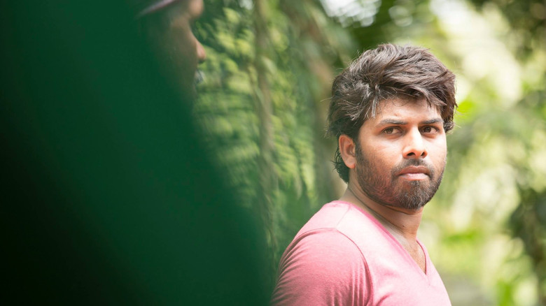 кадр из фильма കൂതറ