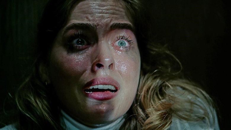 кадр из фильма В твоем доме кто-то есть