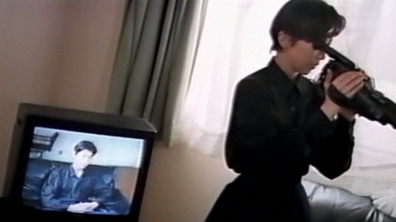 кадр из фильма 浮気妻 恥辱責め