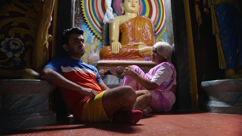 кадр из фильма මෝඩ තරිඳු