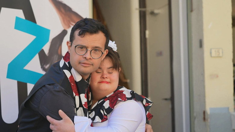 кадр из фильма Amours trisomiques, l'amour des siens