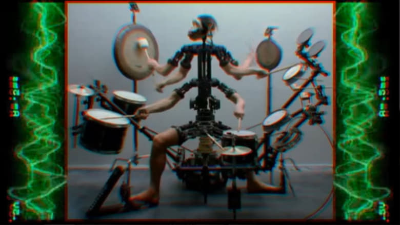 кадр из фильма Monkey Drummer