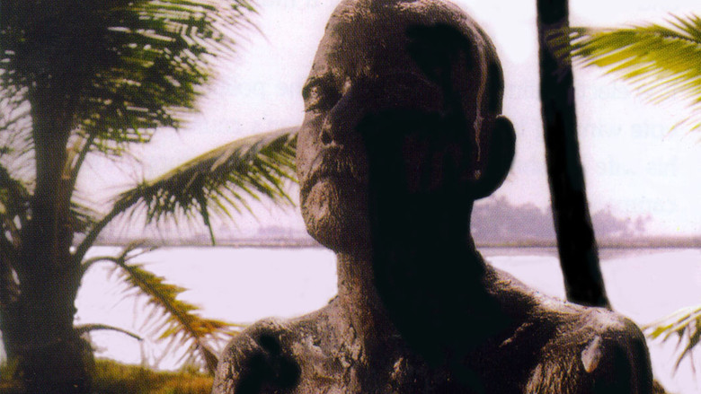 кадр из фильма മരണസിംഹാസനം