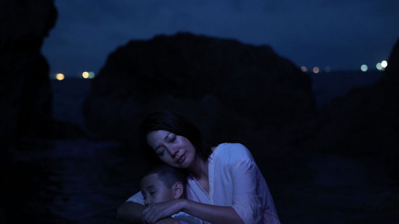 кадр из фильма 神的母親