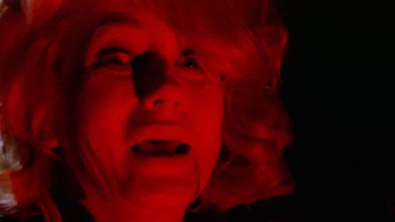 кадр из фильма Кровь и черные кружева