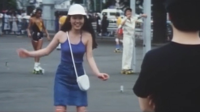 кадр из фильма 女高生 夏ひらく唇