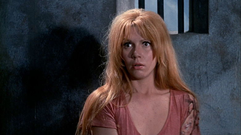 кадр из фильма Женщины в клетках