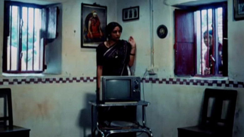 кадр из фильма ಮನೆ