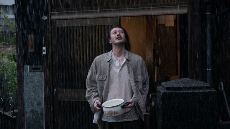 кадр из фильма 夏の砂の上